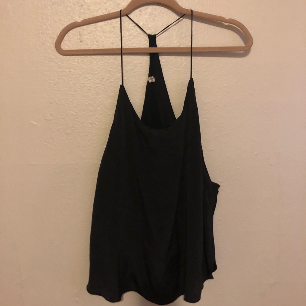 Excellent tank for layering or a night out!